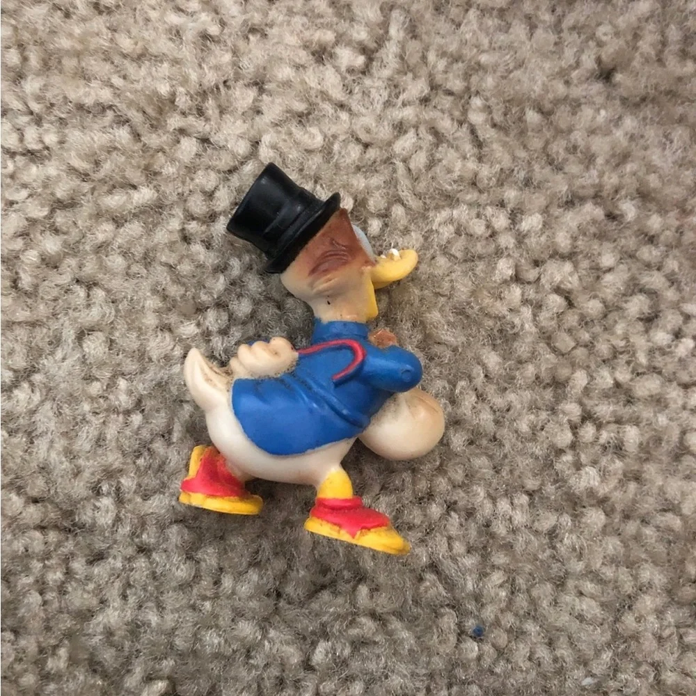 Vintage Disney action figures - daffy, minnie, and goofy